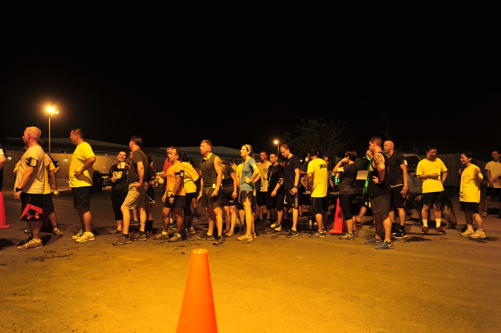 United States service members at Camp Lemonnier, Djibouti, participate in a Super Hero 5K