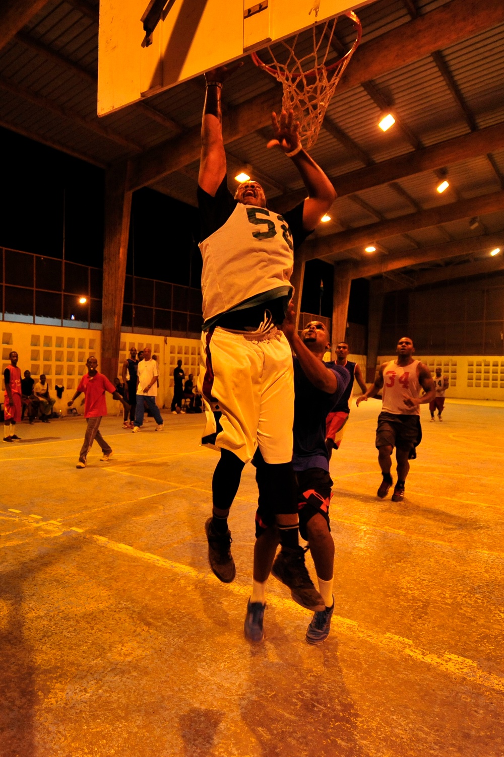 US service members from the joint-service American basketball team play basketball with the Djiboutian basketball team