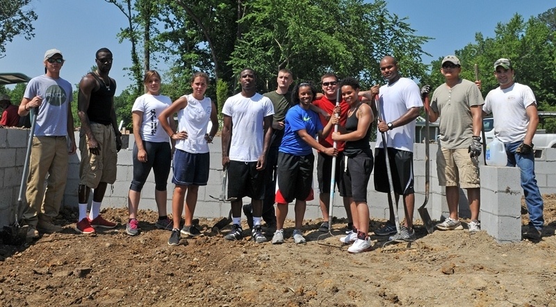 Lincoln Sailors lay ground work for families in need