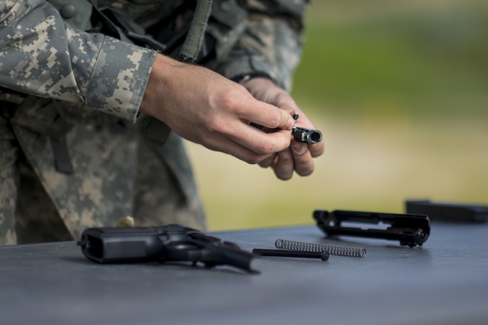 Soldiers fire rounds into pop-up targets during the 2014 Army Reserve Best Warrior Competition