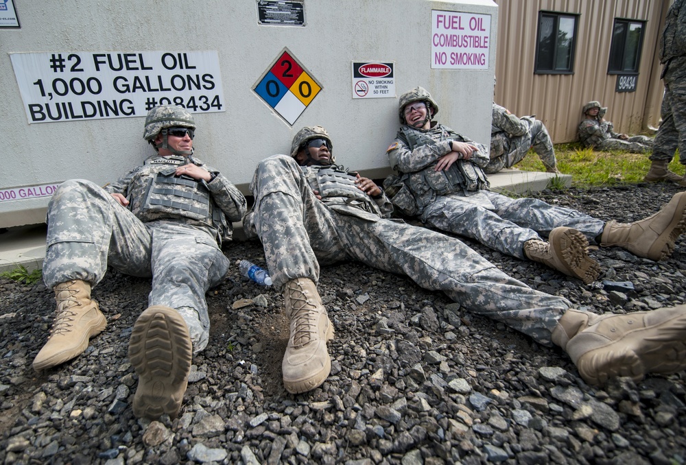 Soldiers fire rounds into pop-up targets during the 2014 Army Reserve Best Warrior Competition