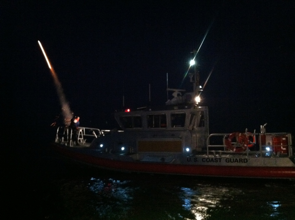 Coast Guard uses flares to turn night into day