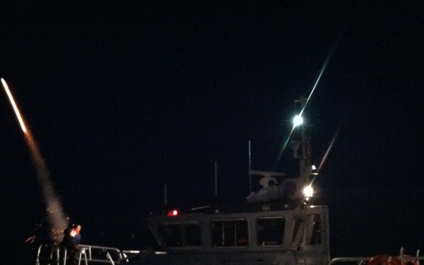 Coast Guard uses flares to turn night into day