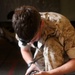 11th MEU Marines maintain weapons aboard USS Comstock