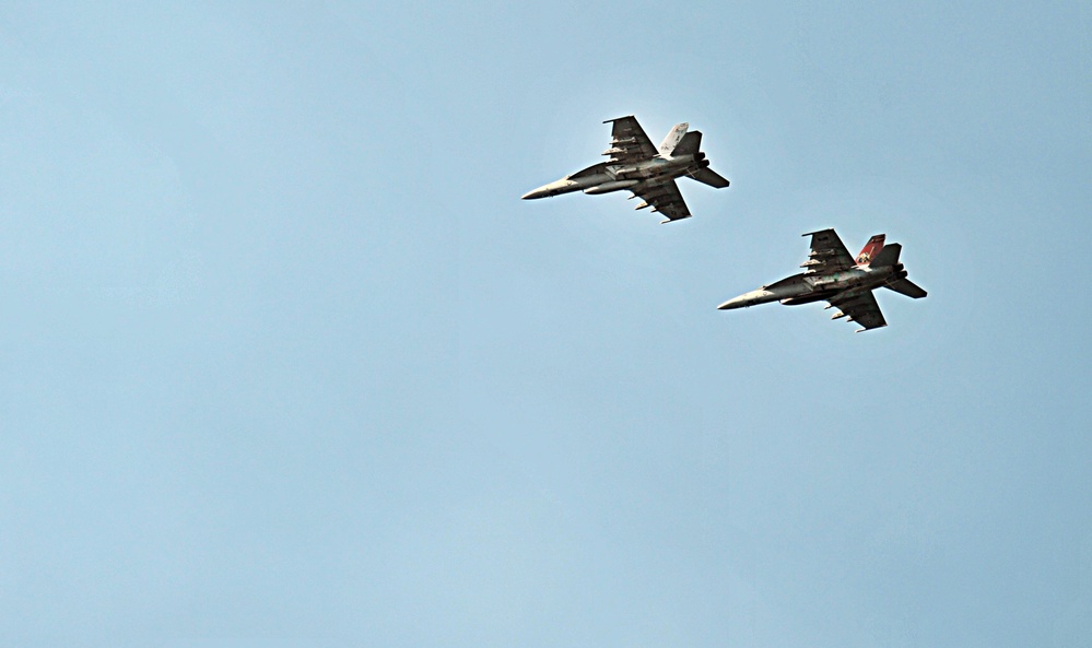 USS George H.W. Bush fly over