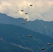 173rd Airborne Brigade lands after a jump June 19, 2014 from a 12th Combat Aviation Brigade CH-47 Chinook helicopter at Juliet Drop Zone in Pordenone, Italy