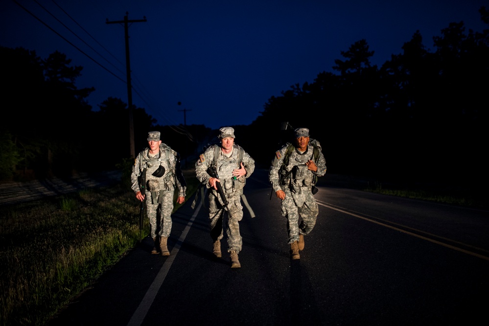 Soldiers endure an 8-mile road march during 2014 Army Reserve Best Warrior Compeition