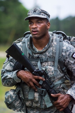 Soldiers endure an 8-mile road march during 2014 Army Reserve Best Warrior Compeition