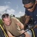 US Navy divers and Belizean Coast Guard divers work together during Southern Partnership Station '14.