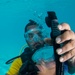 US Navy divers and Belizean Coast Guard divers practice SCUBA emergency procedures in a pool