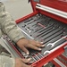 Crew chief inspects flight line tool box