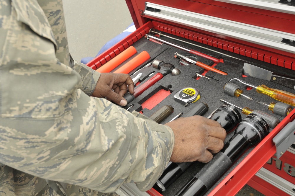 Crew chief inspects flight line tool box