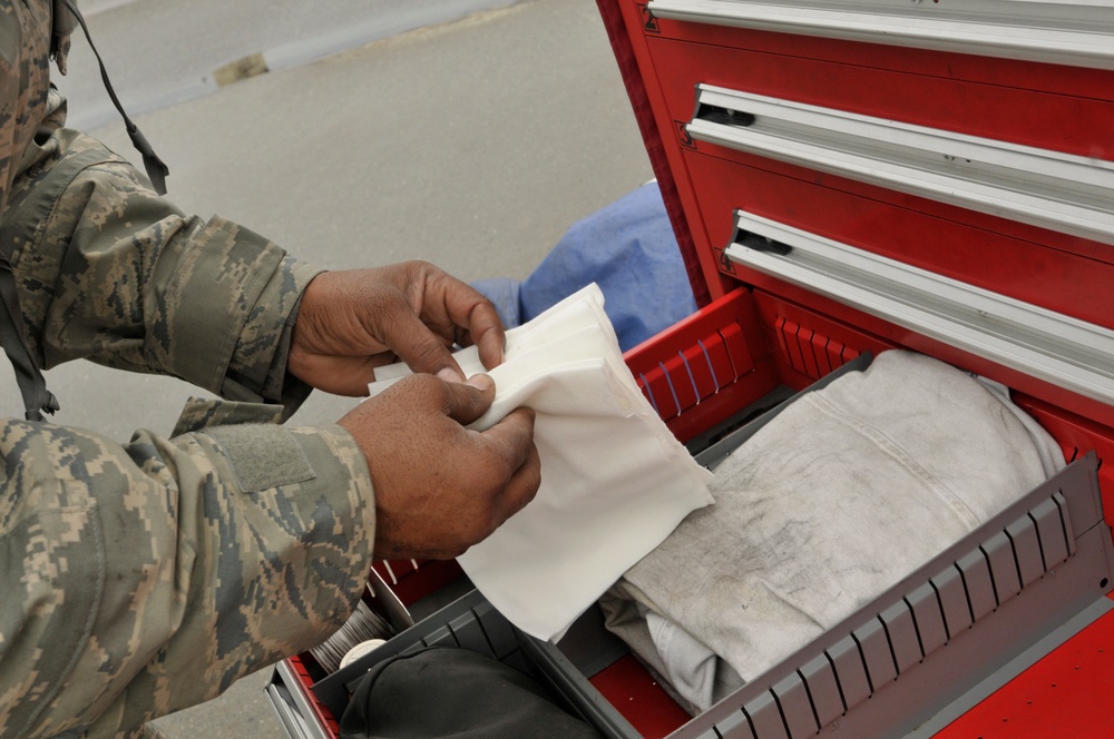 Crew chief inspects flight line toolbox