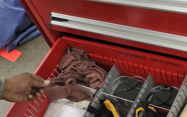 Crew chief inspects flight line tool box