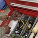 Crew chief inspects flight line tool box