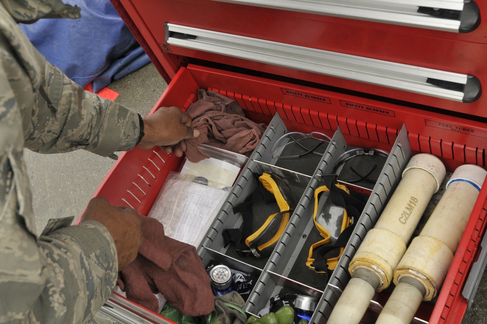 Crew chief inspects flight line tool box