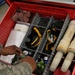 Crew chief inspects flight line tool box