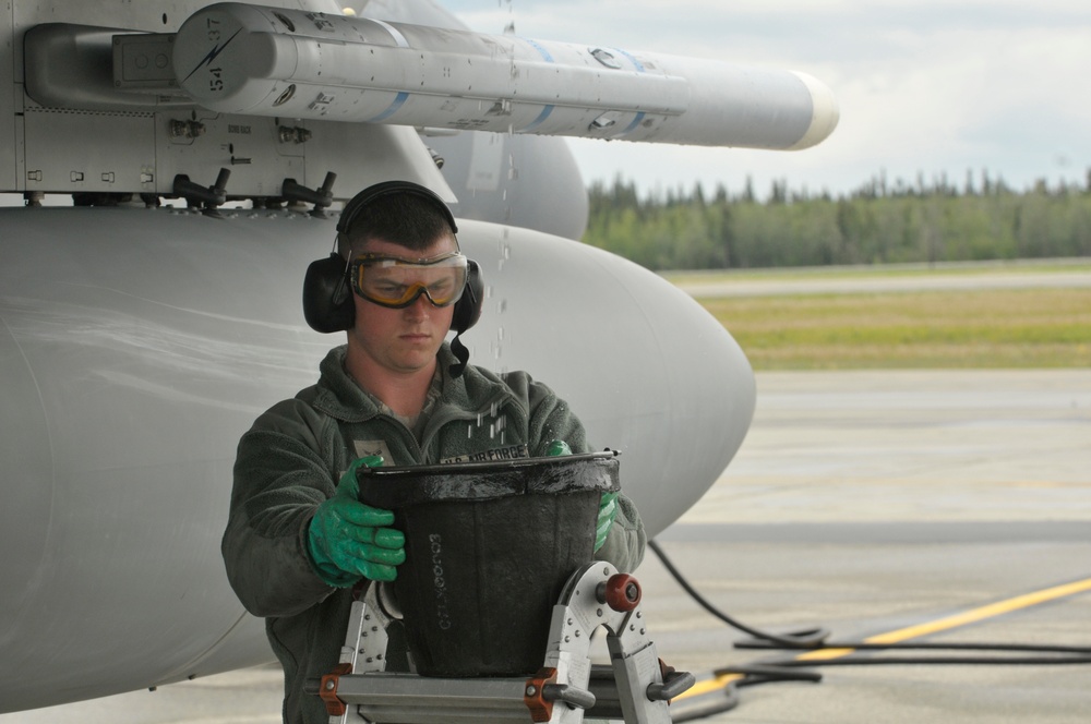 Airman drains F-15C surge boxes