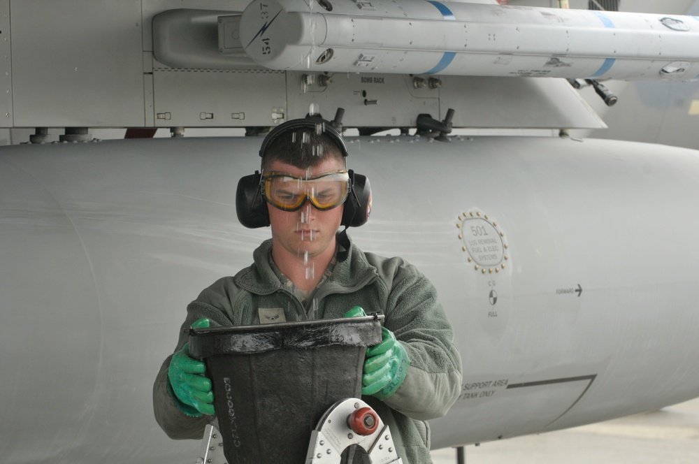 Airman drains F-15C surge boxes