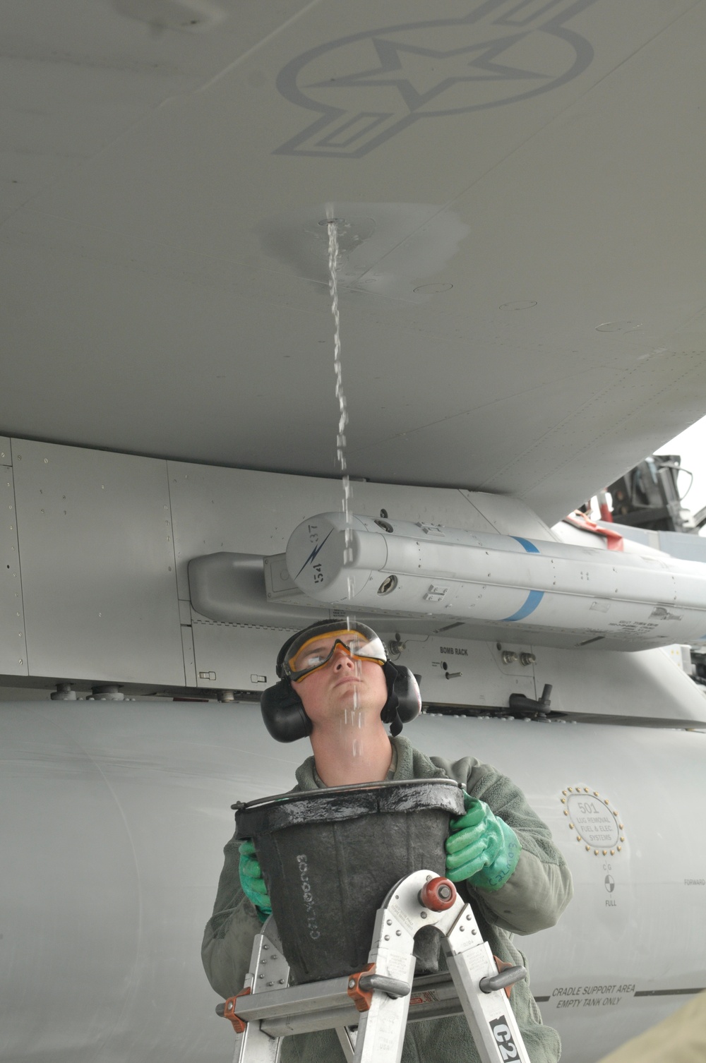 Airman drains F-15C surge boxes