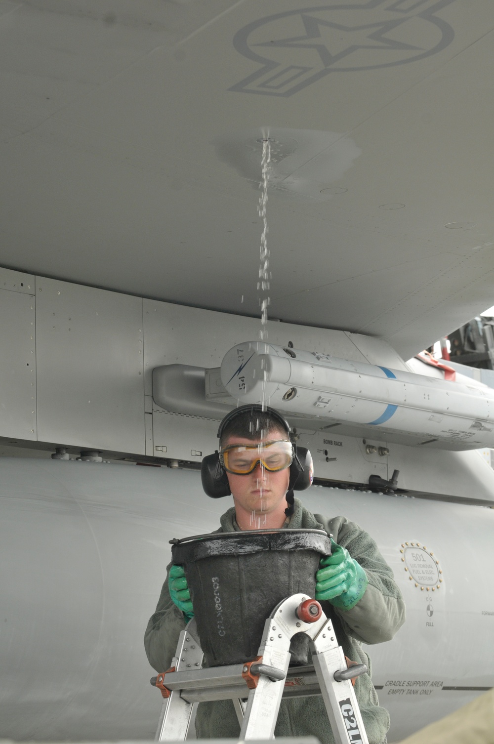 Airman drains F-15C surge boxes