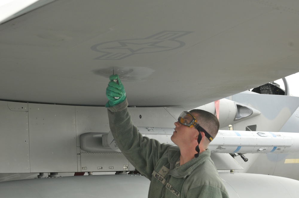 Airman drains F-15C surge boxes