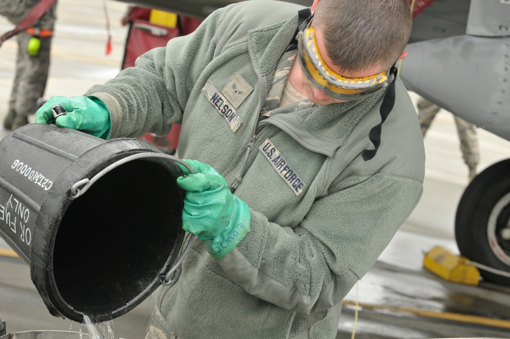 Airman drains F-15C surge boxes