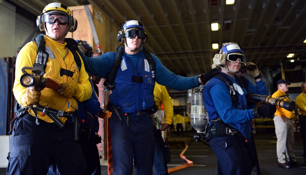 USS Peleliu participate in crash and salvage training
