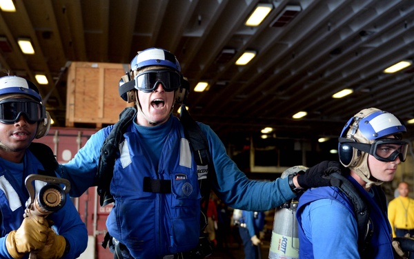 USS Peleliu participate in crash and salvage training