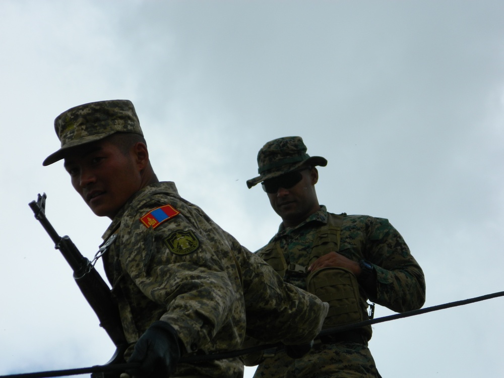 Mongolian Armed Forces members learn hasty rappelling techniques from US Marine instructors