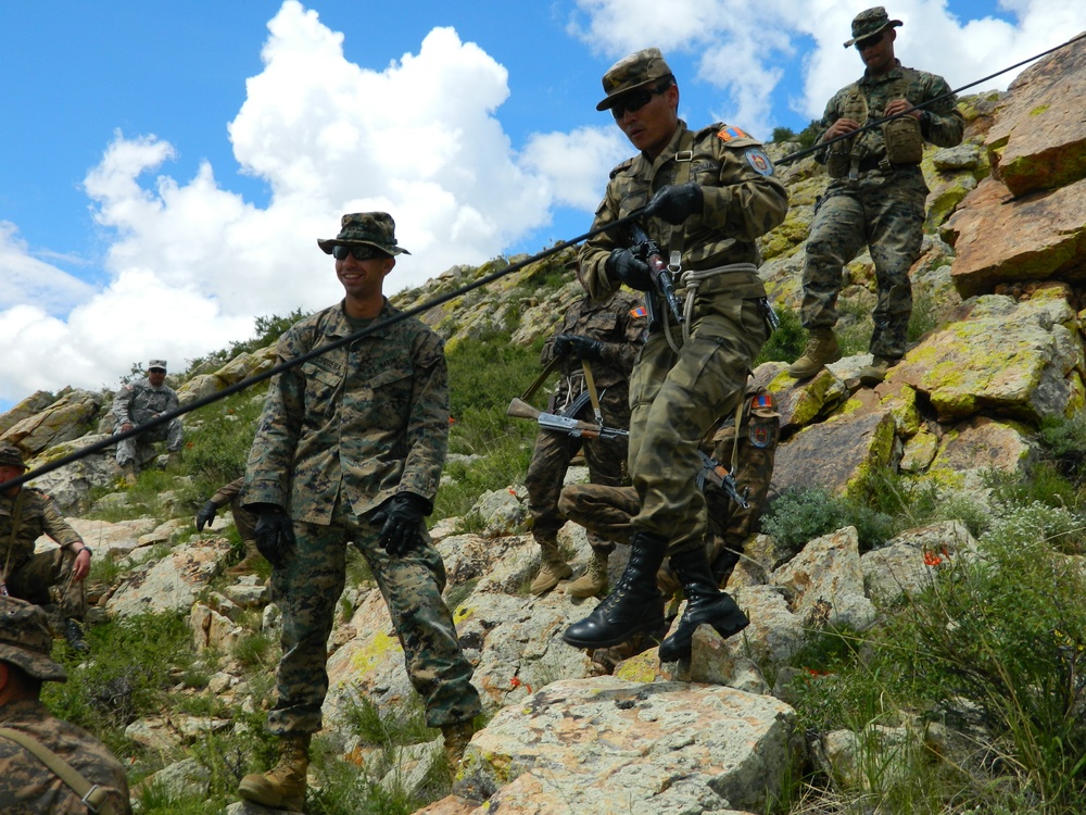 Mongolian Armed Forces members learn hasty rappelling techniques from US Marine instructors