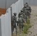 173rd Airborne Brigade prepare to enter and assault a building while participating in urban operations training at the Dandolo Range, Pordenone, Italy, June 19, 2014