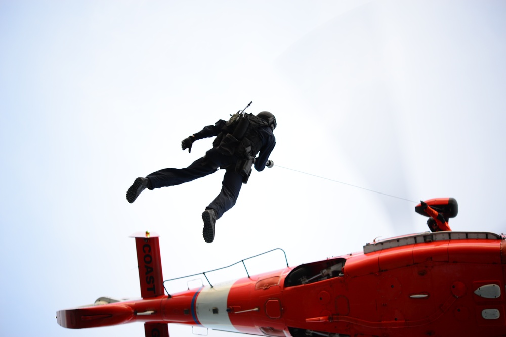 A Coast Guard MSST conducts helicopter hoist training