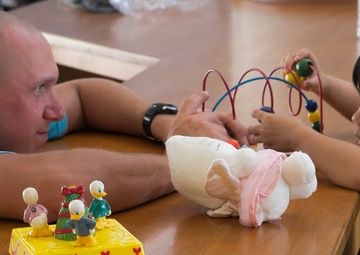 Marines, sailors dedicate time to local children