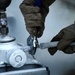 Freezing Air: Airmen prepare liquid oxygen for sampling