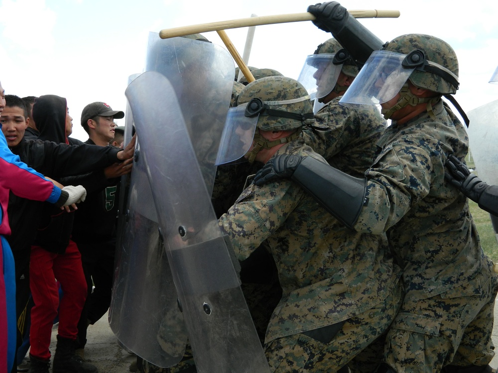 What a riot! Marines practice controlling crowds