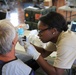 Airman provides dental care during Tropic Care 2014