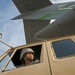 III Corps PFC backs LMTV into C-17