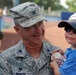 181st Intelligence Wing Commander Throws Ceremonial First Pitch.