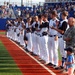 181st Intelligence Wing Commander Throws Ceremonial First Pitch.