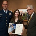 Farmington, Conn., artist receives a Public Service Commendation Award from the United States Coast Guard