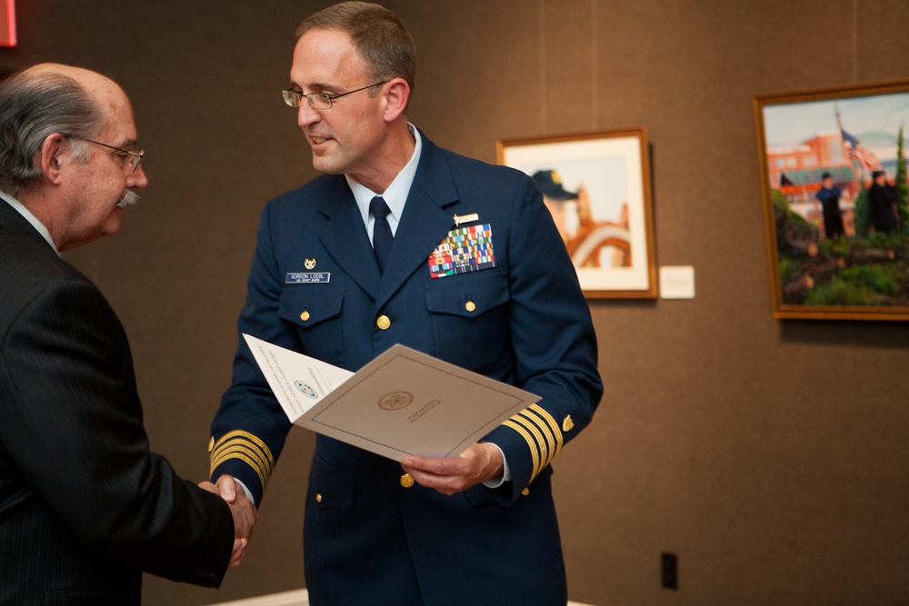 US Coast Guard Capt. Gordon Loebl a Public Service Commendation Award