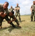 Marines teach Mechanical Arm-Control Hold techniques during Platinum Wolf 14