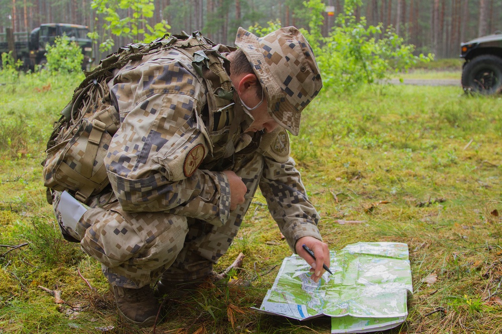 Paratroopers, Latvian soldiers navigate forest, friendships