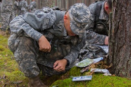 Paratroopers, Latvian soldiers navigate forest, friendships