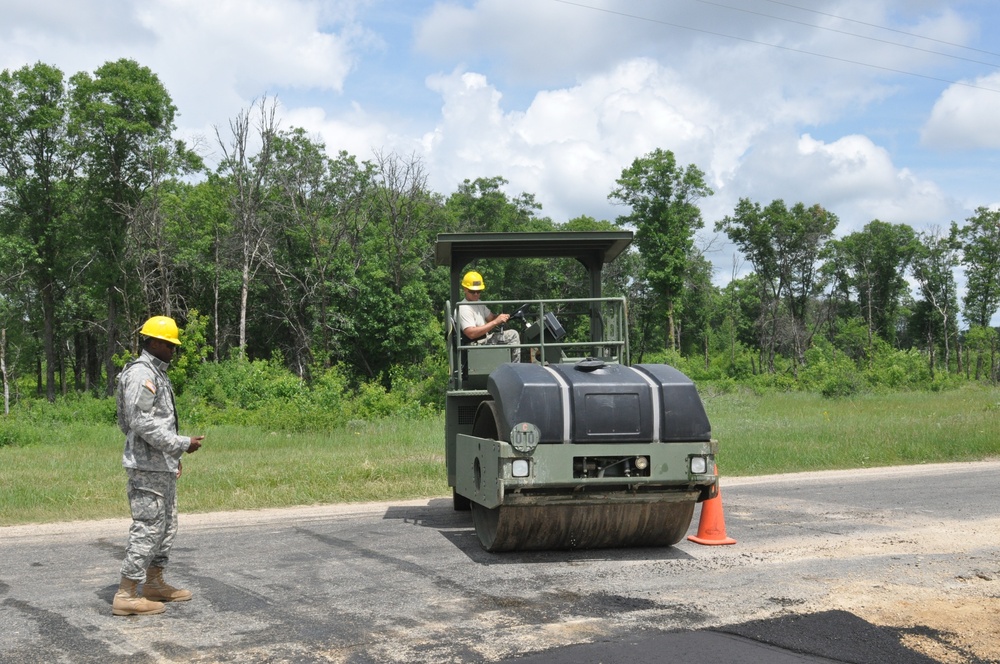Army engineers pave training convoy road