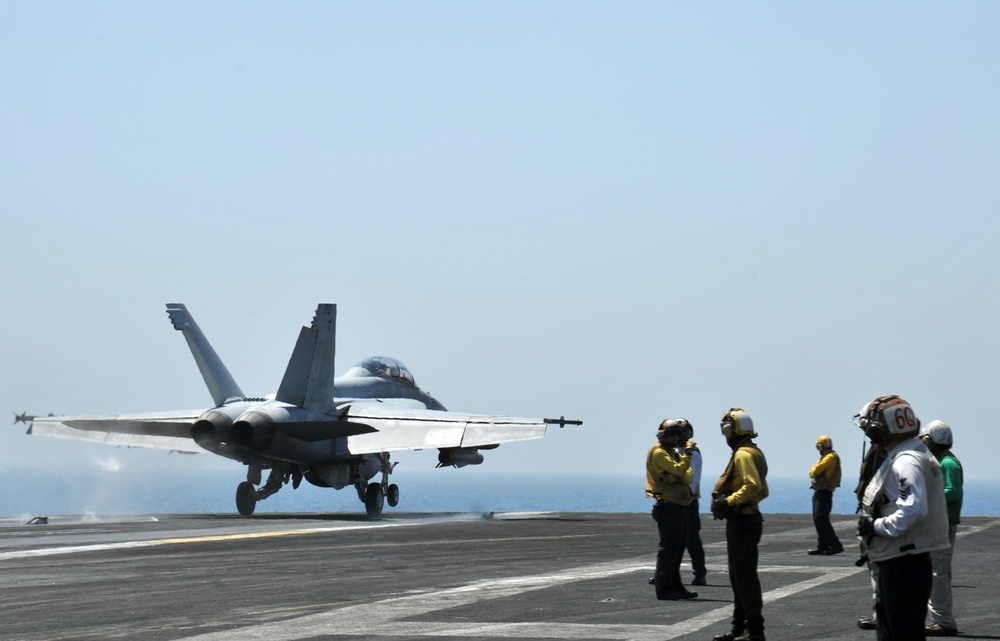 during a general quarters drill on the flight deck of the aircraft carrier USS George H.W. Bush