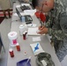 Pharmacist verifies prescription during Northern Louisiana Care 2014