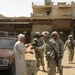 Gen. Jeffrey W. Talley speaks with business owner in Jameela Market