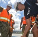 Navy Cargo Handling Battalion 14 (NCHB 14) reservists, HMNZS Canterbury (L 421) onload